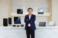 Samson Hu ASUS Co-CEO beside ASUS CES 2025 lineup