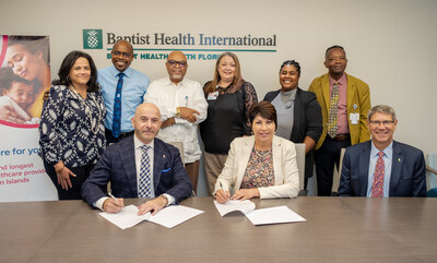 Dr. Galed Hakim, Assistant Vice President of Healthcare Partnerships and Insurance Development at Baptist Health International, and Lizzette Yearwood, CEO of the Cayman Islands Health Services Authority, proudly sign an MOU to strengthen collaboration and elevate healthcare services in the Cayman Islands.