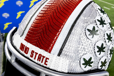 The cutting-edge tread of the Goodyear Assurance WeatherReady® 2 tire serves as the iconic red stripe of Ohio State's team helmet tire art sculpture commissioned by Goodyear for the 89th Goodyear Cotton Bowl Classic. The commissioned tire art will appear on-site as Ohio State competes against Texas at the Goodyear Cotton Bowl Classic on Friday, Jan. 10. (Brandon Wade/AP Images for Goodyear)