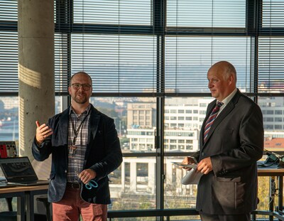  Kyle Crum (left), director, and Marek Obitko, research lab manager, advanced technology, Rockwell Automation, open a new research lab in Prague, Czech Republic.