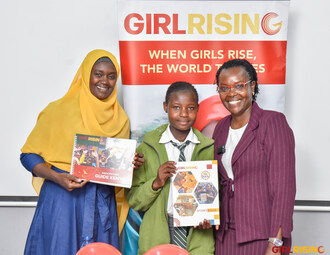 Girl Rising Kenya Program Manager Debbie Odenyi (right) with Rukia Sebit of Sunflower Trust and 14-year old Zarika at the event celebrating the launch of Girl Rising's KICD-endorsed curriculum.