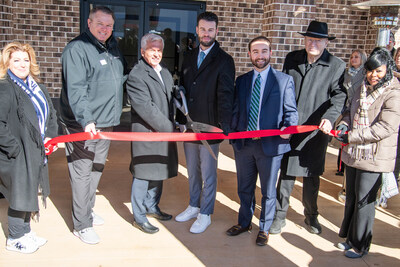 Jeff Morgan, President of EWA Warrior Services, a Sigma Defense Division, is joined by representatives from the office of Congressman Dale Strong, Alabama’s 5th Congressional District, representatives from Huntsville mayor’s office, Tommy Battle, and members of the Huntsville Chamber of Commerce for the opening of the new Huntsville office.