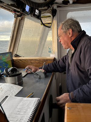 Gloucester’s Tom Hill sets course on a recent GMGI research trip to the Stellwagen Bank National Marine Sanctuary