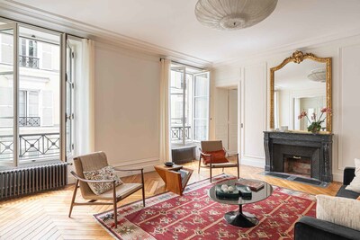 Recently renovated by renowned designer and developer Kasha Paris, this three-bedroom, three-and-a-half-bathroom apartment is a short walk from the Seine, Louvre, and Notre Dame. It features chevron wood floors, large windows, and modern amenities for refined Parisian living. Recently renovated by renowned designer and developer Kasha Paris, this three-bedroom, three-and-a-half-bathroom apartment is a short walk from the Seine, Louvre, and Notre Dame. It features chevron wood floors, large windows, and modern amenities for refined Parisian living.