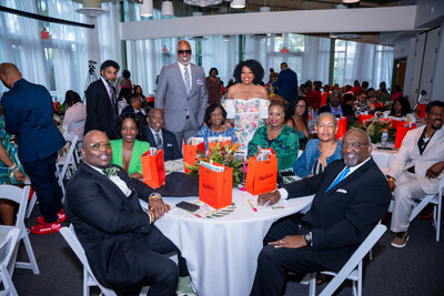Historic Society Executives Roy and Jessica Modkins attend the 75th Anniversary for Richmond Heights, themed Suits, Sundresses, and Sneakers. The couple are shown standing at Honorees Commissioner Dennis C. Moss and Dr. Clarence Jones’s table with guests. The event also served as the official launch of Black History Month, reinforcing the importance of commemorating and sharing Richmond Heights’ contributions to Miami-Dade County and beyond.