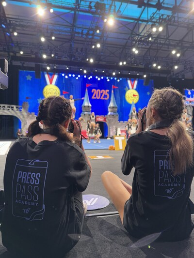 Creekview High School’s yearbook staffers capture content of a cheer team on the national stage.