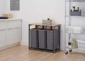 TRINITY Adds Luxury Bamboo Laundry Station to EcoStorage® Line at TIHS 2025