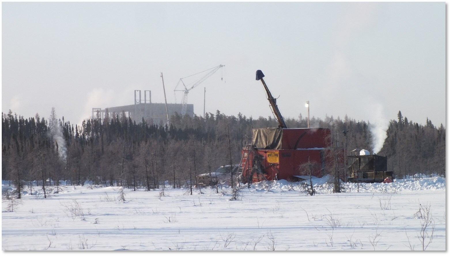 Winter drilling of the Tesla Zone while the McIlvenna Bay Mill rises above the treeline to the south. (CNW Group/Foran Mining Corporation) Winter drilling of the Tesla Zone while the McIlvenna Bay Mill rises above the treeline to the south. (CNW Group/Foran Mining Corporation)