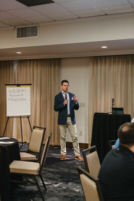 Kyle Matthews of Janet Davis Cleaners leading AWGS Annual Meeting