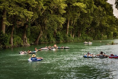 Tubers enjoy a float down the refreshing Guadalupe River.