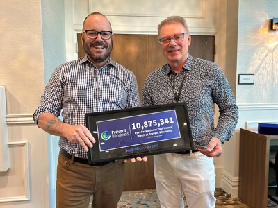 Prevent Blindness President & CEO Jeff Todd (left) presents Paul G. Howes, EVP, Strategy & Business Development at Translatum Medicus Inc., (right), with the “Louisa Lee Schuyler Award.”