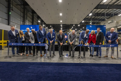 Republic Services CEO Jon Vander Ark, Indiana Gov. Mike Braun and other leaders and officials cut a ribbon to officially open the Indianapolis Polymer Center-Blue Polymers plastics recycling complex on Tuesday, March 18, 2025.