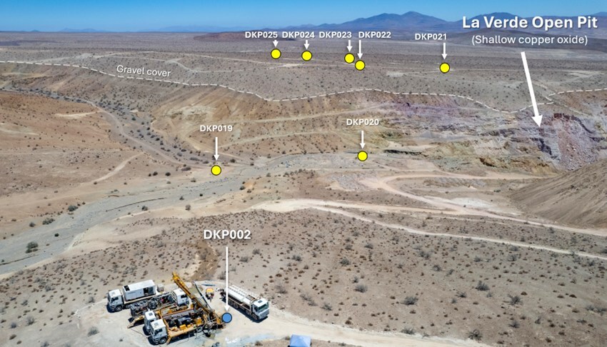 View looking SW across the La Verde copper-gold porphyry discovery – showing collar locations of seven step-out drill holes relative to discovery hole DKP002 and historic copper oxide open pit area. (CNW Group/Hot Chili Limited) View looking SW across the La Verde copper-gold porphyry discovery – showing collar locations of seven step-out drill holes relative to discovery hole DKP002 and historic copper oxide open pit area. (CNW Group/Hot Chili Limited)