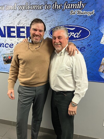 Buyer Austin Pugmire (l) and Seller, Bob Winiarczyk Pioneer Ford, Bremen GA (CNW Group/Dealer Solutions North America Inc.)