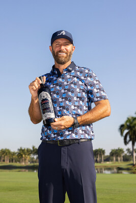 Captain Dustin Johnson of 4Aces GC poses with DAOU Soul of a Lion. (Photo Credit Chris Trotman LIV Golf)