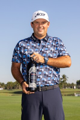 Patrick Reed of 4Aces GC poses with DAOU Soul of a Lion. (Photo Credit Chris Trotman LIV Golf)