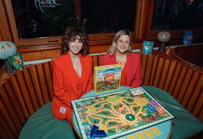 “Adventures in Friskies World” was created by award-winning board game designer Ellie Dix (right) with insights from Purina pet behaviorist Dr. Annie Valuska (left) and features cat-inspired adventures to help cat owners bring creativity into playtime with their cats.