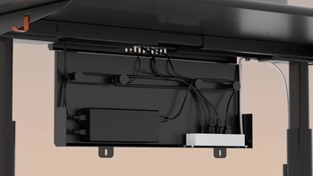 Cable management system with power outlets equipped is hidden under the tabletop effectively creating a clean, tangle-free environment