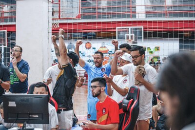 Phygital athletes competing in the digital part of a phygital ranking tournament.