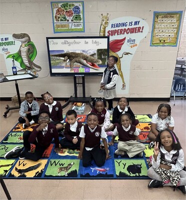 Atlanta area pre-K students sit in front of the Interactive Zoo Panel, which is a favorite tool from their teacher, Mr. Jay. Atlanta area pre-K students sit in front of the Interactive Zoo Panel, which is a favorite tool from their teacher, Mr. Jay.