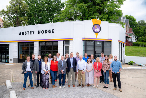 Anstey Hodge team in front of their renovated 1950s service station office.