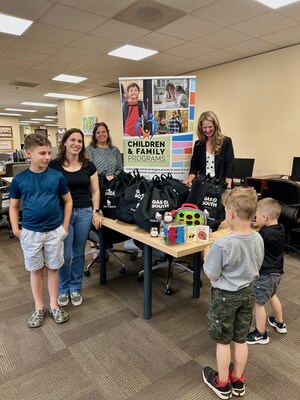 Gas South's Director of Corporate Giving, Carley Stephens, delivered Nana Packs to Kennesaw State University.