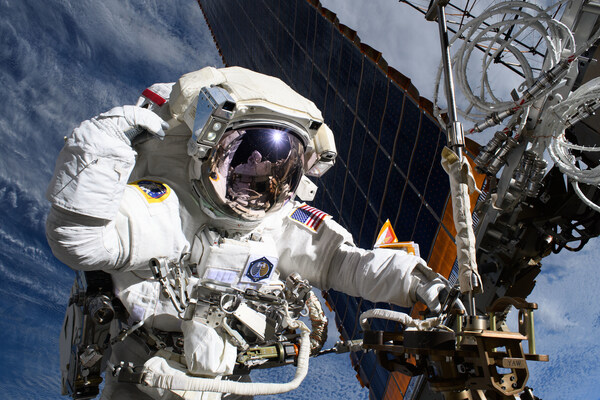 Astronaut Anne McClain is pictured on May 1, 2025, near one of the International Space Station's main solar arrays. Credit: NASA Astronaut Anne McClain is pictured on May 1, 2025, near one of the International Space Station's main solar arrays. Credit: NASA