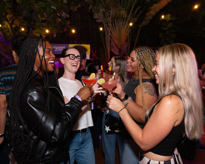 Guests enjoy Smirnoff Electric Guava and Smirnoff Spicy Tamarind cocktails at Calle Electric