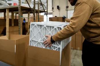 Finished air filters are transferred from our manufacturing facility to our distribution center, both based in Greenwood, Indiana.