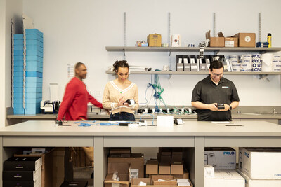 SignaPay's new deployment room features an island work station.