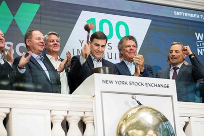 Wesco executives celebrating the company's 100th birthday at the New York Stock Exchange in 2022.