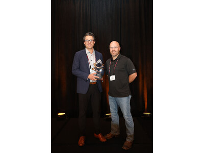 Jeff Edwards, owner of DENT Quick Lube, accepts the 2024 Franchisee of the Year award from Jiffy Lube International, recognizing excellence in service, innovation, and community impact across 8 locations in Oregon and Washington.