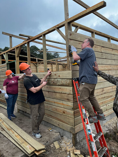 Crimson Cup team members help to build a house for a local family in Siguatepeque, Honduras.