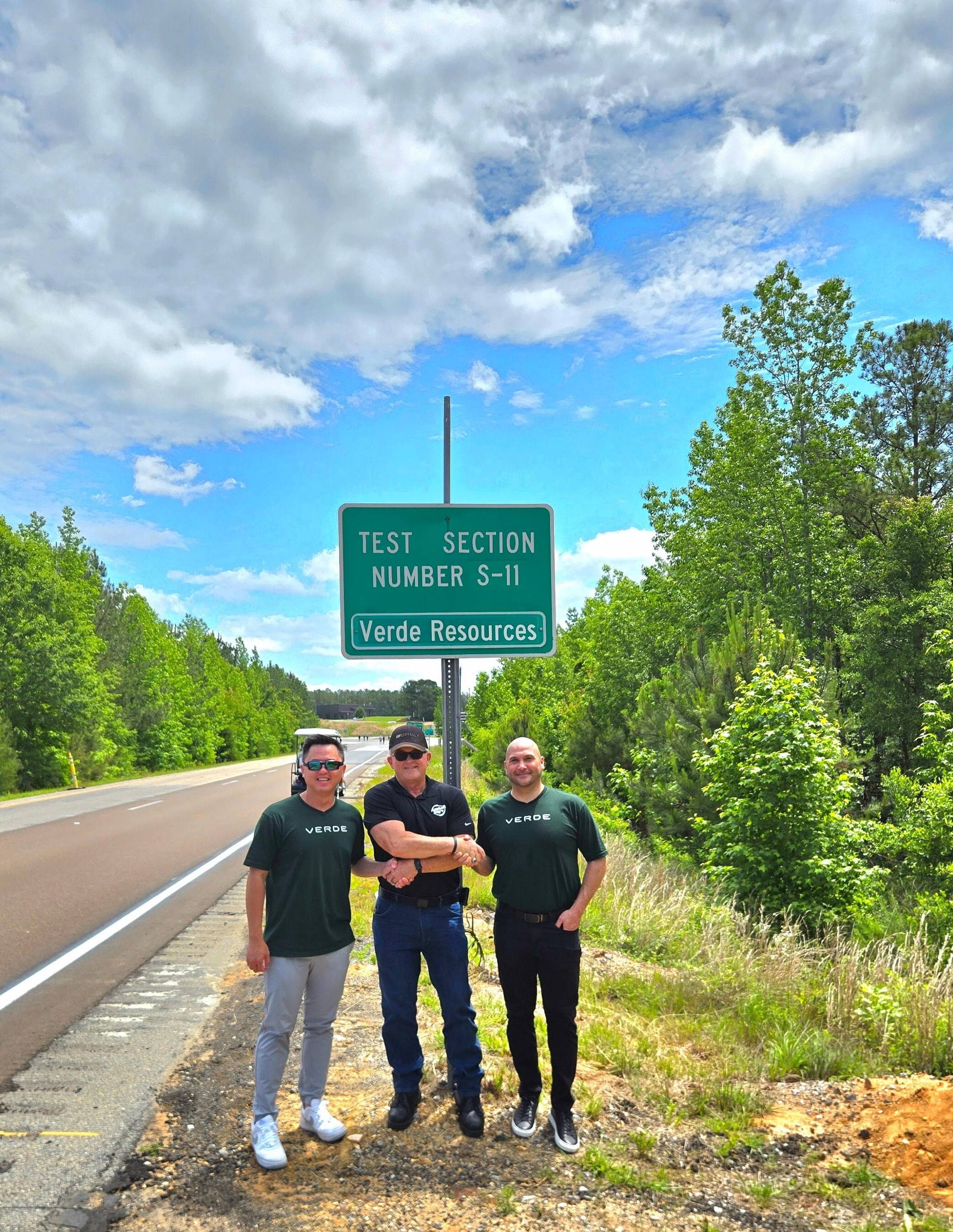 Dr. Buzz Powell (center), flanked by Verde CEO Jack Wong (left) and COO Eric Bava (right), at Verde’s S-11 test section on the NCAT Pavement Test Track in Alabama
