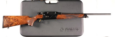 Strasser Evolution RS 14 sporting bolt-action rifle chambered for 6.5 Creedmoor. Serial No. 1A0043. Takedown with blue finish and highly figured and marbled oil-finished walnut stocks. Single-set trigger, straight pull design with detachable magazine. Excellent with no indication of use. Mechanically excellent 20in barrel. Factory takedown luggage case. Estimate: $3,500-$4,500