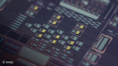 Picture of IMEC 300 mm Si photonic wafer with InP laser dies bonded on top. Picture of IMEC 300 mm Si photonic wafer with InP laser dies bonded on top.