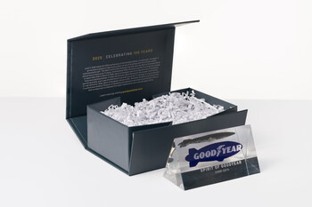 The Spirit of Goodyear keepsake item includes a genuine piece of envelope that flew with the Spirit of Goodyear blimp across North America from 2000 to 2014, wrapped in a commemorative 100th anniversary box.