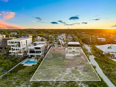 The property sits at an elevation of approx. 17 ft, one of the highest elevations for oceanfront property in Atlantic Beach. It currently contains two living structures: a main residence (2,412 sf; 3 beds; 2.5 baths) and a guest cottage (1,048 sf; 2 beds; 1 bath). OceanfrontLuxuryAuction.com.