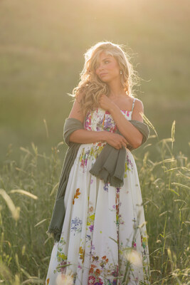 The Catherine Dress — soft ivory with garden florals, a fitted bodice, and flowy skirt. Made for sunshine, movement, and moments that feel like poetry.