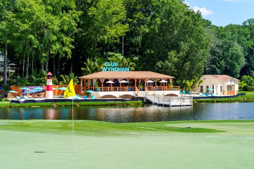 Sedgefield Country Club has once again transformed into a tropical oasis as it welcomes the 86th annual Wyndham Championship. Above, this year’s Club Wyndham Beach, a hallmark of the tournament.