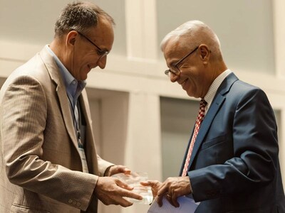 Ken Jozefczyk, left, director of BayCare Central Pharmacy, and Mike Magee, right, BayCare’s vice president and chief pharmacy officer, accepted the Pharmacy Compounding Excellence Award from Premier, Inc. during the 2025 Breakthroughs Conference & Exhibition, held July 15–17, 2025.