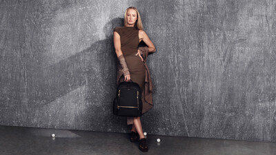 Nelly Korda pictured with the Voyageur Celina Backpack in Black/Gold. Nelly Korda pictured with the Voyageur Celina Backpack in Black/Gold.
