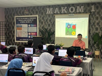 Students using the Literacy Pro digital platform during class