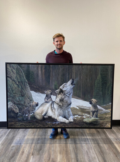Wildlife Artist James Corwin holds his original painting of wolves. This painting has been sold many times as a limited edition print series to collectors around the country. Artwork still provides a valuable source of income to working artists and will become more valuable as AI presses in on algorithm-generated imagery. Wildlife Artist James Corwin holds his original painting of wolves. This painting has been sold many times as a limited edition print series to collectors around the country. Artwork still provides a valuable source of income to working artists and will become more valuable as AI presses in on algorithm-generated imagery.