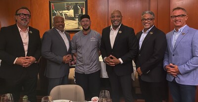 Founder and CEO, Victor Young and team, with Chef Partner Jacob Rosario, of Flemings Steak House in San Antonio.