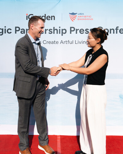 Adam Andrasko (USA Artistic Swimming CEO) and Cathy Wang (iGarden Director of Operations, Swim Jet P Series) shake hands at the iGarden x USA Artistic Swimming Summer Soiree on August 14th 2025 in Los Angeles, CA.