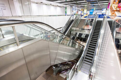 Otis escalators at City Hall MRT Station. Otis escalators at City Hall MRT Station.