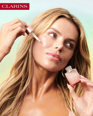 Brooks Nader with Clarins Multi-Active Serum