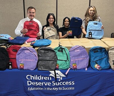 SchoolsFirst FCU team delivers backpacks to San Bernardino County Office of Education.