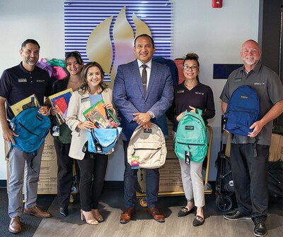 SchoolsFirst Federal Credit Union delivers backpacks to Riverside County Office of Education.